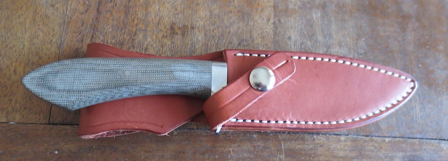 In the sheath. I should say that the sheath is made from premium, full-grain leather. 