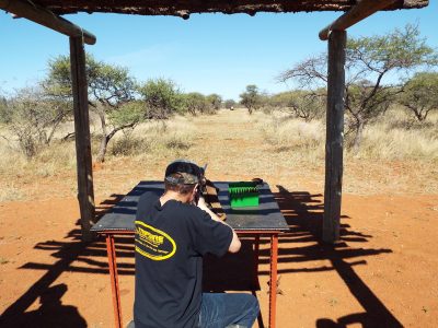 The author's son is shown here sighting in a Sako .270 Win. rifle before heading out into the wild.