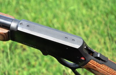 The solid-top design of the Marlin simplifies mounting an optic. Note the crossbolt-style safety with exposed red ring.