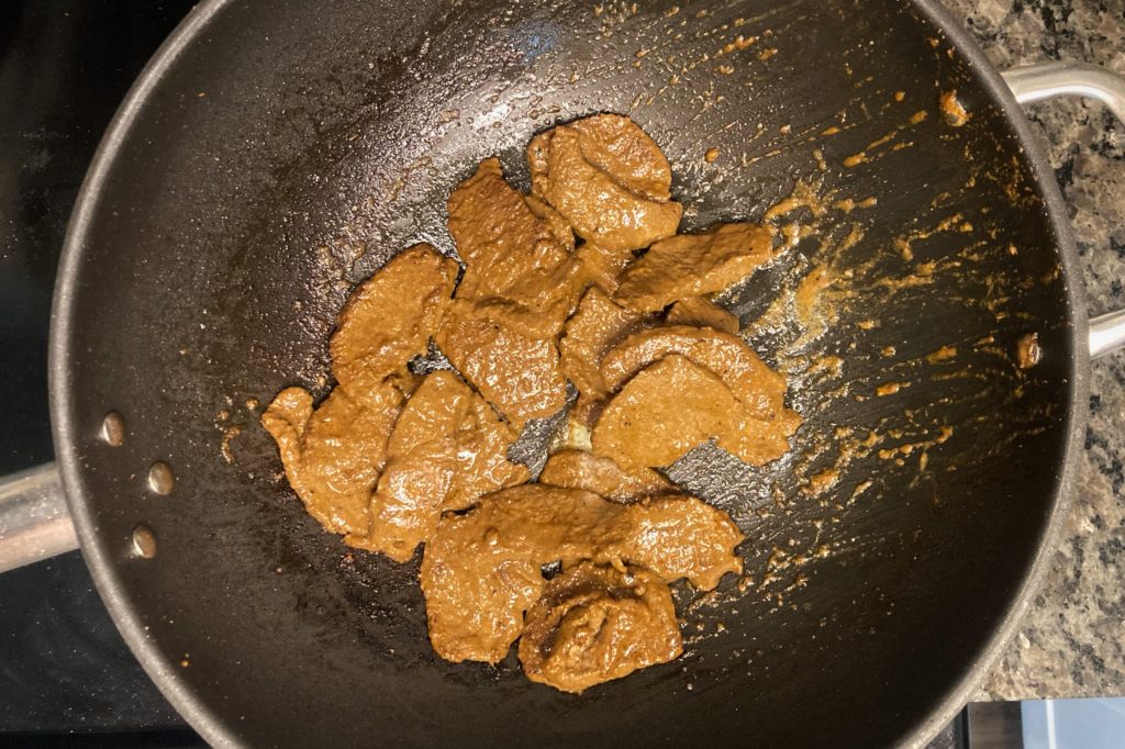 The steak for venison fajitas is getting cooked