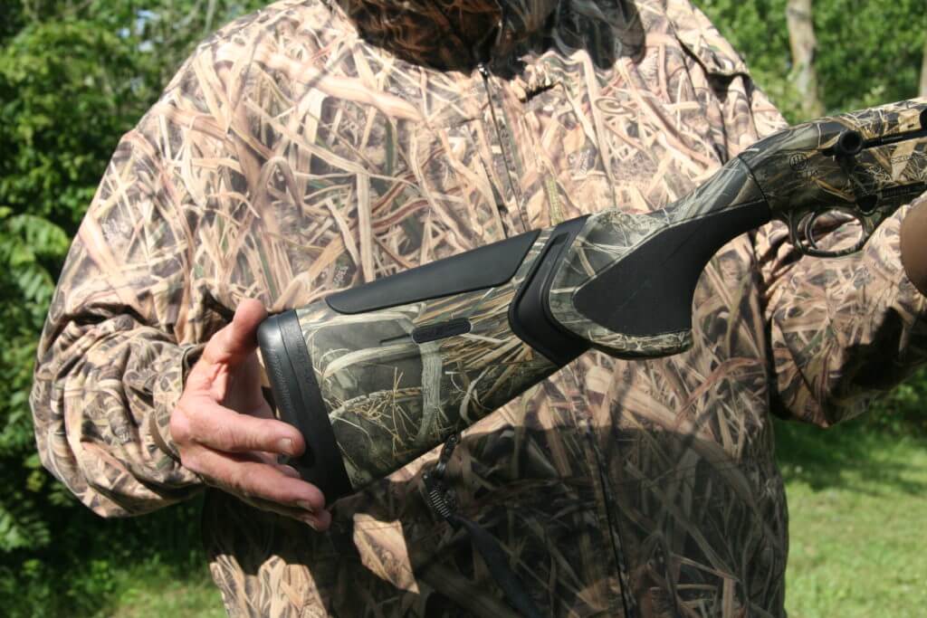 Hunter examining the buttstock of the Beretta A-400